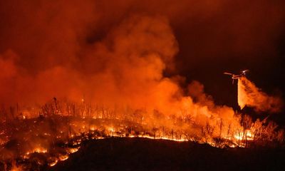 Nearly 30,000 people in northern California evacuated as raging wildfire spreads