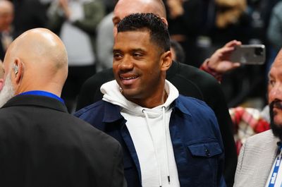 Seahawks gift Russell Wilson with a throwback jersey