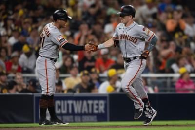 Mike Yastrzemski And Teammates In Action On Baseball Field