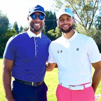 Larry Fitzgerald And Friend Tee Off For A Golf Game