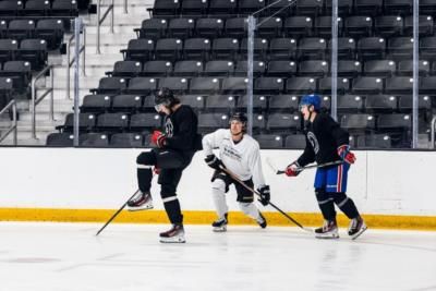 Jack Hughes Demonstrates Determination And Teamwork In Training Photos