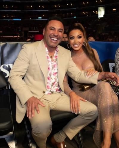 Oscar De La Hoya And Holly Sonders Share A Candid Moment