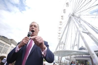 Nigel Farage Faces Heckling At Press Conference Celebration
