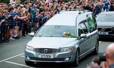 ‘He was an inspiration’: rugby fans pay tribute at Rob Burrow funeral