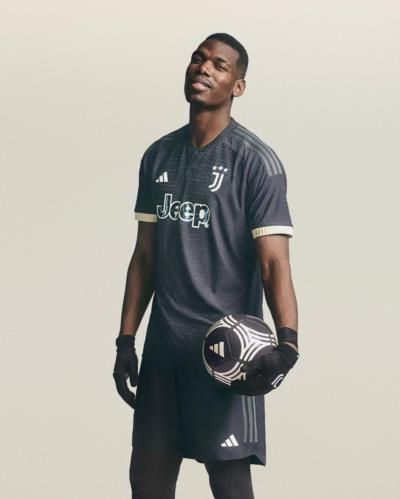 Paul Pogba Flaunts Fashionable Grey Jersey In Photo Shoot