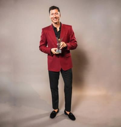 Robert Lewandowski's Stylish Black And Maroon Outfit