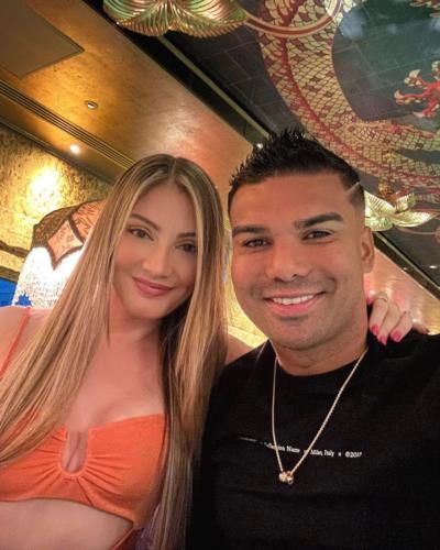 Casemiro And Wife Stylishly Coordinated In Black And Peach Outfits