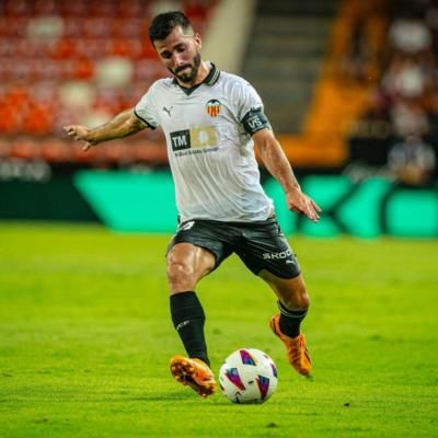 José Gayà Showcasing Skills During Intense Football Game