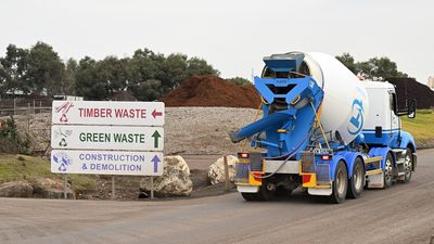 Man arrested after woman's body found at rubbish tip