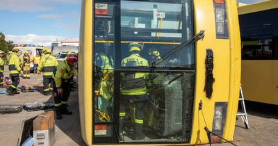 Hunter firefighters simulate bus rollover for special training