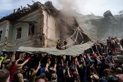 Kyiv mourns as rescuers sift piles of rubble at a children's hospital hit by a Russian missile