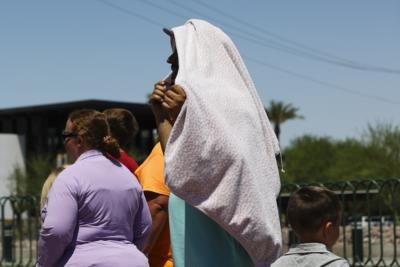 Heat Wave Grips Western U.S., Death Valley Draws Tourists