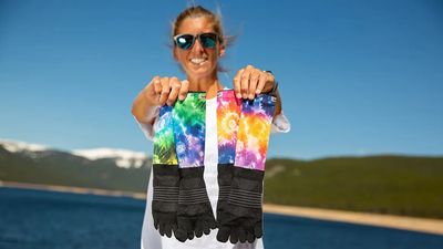 Trail running legend Courtney Dauwalter says her colorful new toe socks are “a party on your feet”