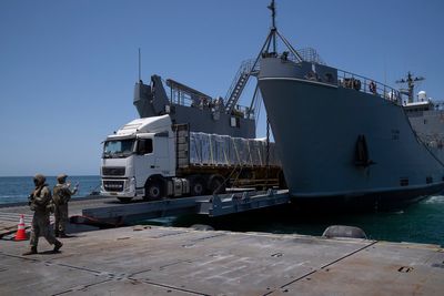 US-built pier will be put back in Gaza for several days to move aid, then permanently removed