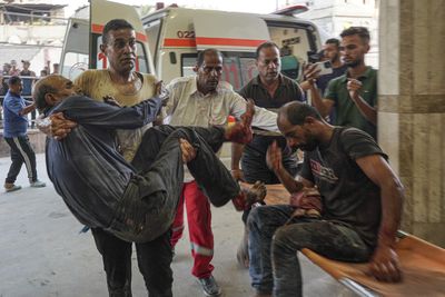 Israel bombs Gaza school, killing 30 Palestinians as truce talks continue