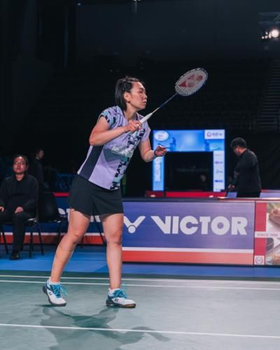 Beiwen Zhang Showcasing Skills In Intense Badminton Competition