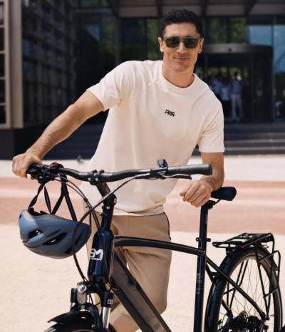 Robert Lewandowski Showcasing Confidence With A Bicycle