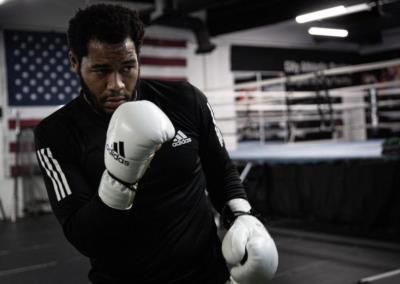 Michael Hunter Showcasing Boxing Skills In Black Top And Gloves