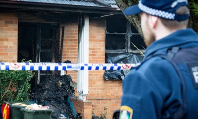 Father charged with murder locked doors before three children killed in Sydney house fire, police allege