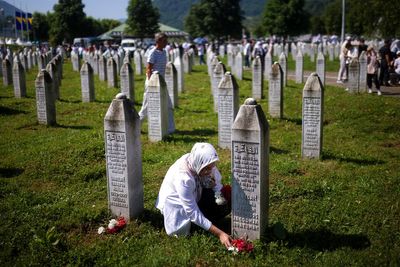 Thousands mark 1995 Srebrenica genocide which is denied by Serbs, fueling ethnic tensions in Bosnia