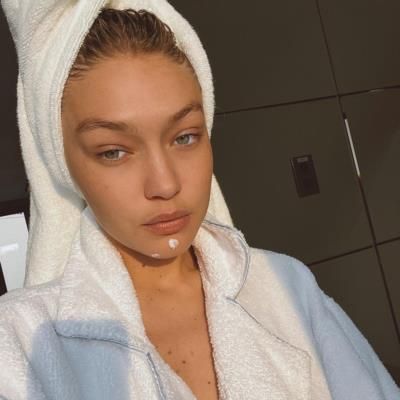 Gigi Hadid Radiates Effortless Beauty In Sunlit Towel Gown Snap