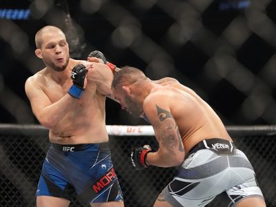 UFC free fight: Santiago Ponzinibbio viciously stops Alex Morono in emotional victory