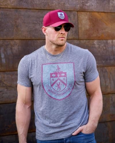 J.J. Watt Stylishly Poses In Grey Tee And Maroon Cap