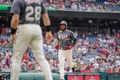 Jeimer Candelario's Energetic Teamwork Captured In Match Photos