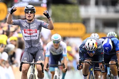 Jasper Philipsen outsprints Wout van Aert to win stage 13 of the Tour de France in Pau
