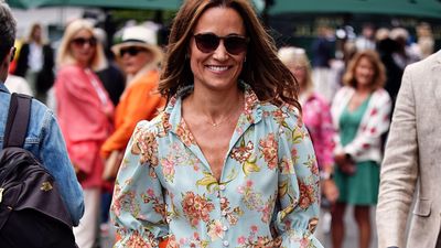 Pippa Middleton's Wimbledon 2024 jumpsuit is the epitome of bold floral dressing as she goes for fail-safe raffia clutch and wedges combo