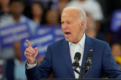 Biden shrugs off calls to exit presidential race as he takes aim at Trump’s ‘Project 2025’