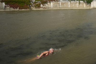 France's sports minister takes dip in Seine in boost for Olympics organisers