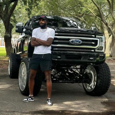 NBA Player Mitchell Robinson With Towing Truck In Photo