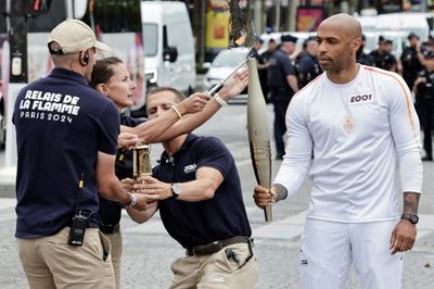 Olympic Torch Relay Seeks To Win Over Sceptical Parisians