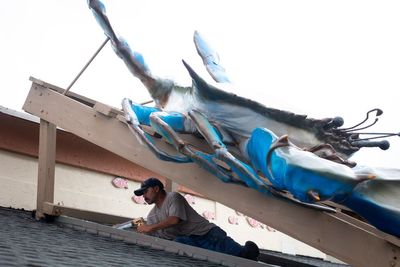 In beachy Galveston, locals buckle down without power after Beryl's blow during peak tourist season