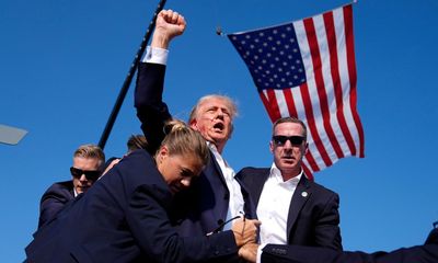 ‘The job is all about anticipation’: behind the lens of the defining photo of the Trump rally shooting