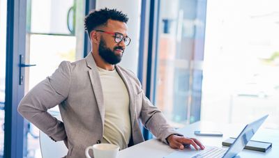 A physical therapist says you should do these three things every hour to offset the damage of your desk job