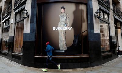 Burberry replaces chief executive as it issues fresh profit warning