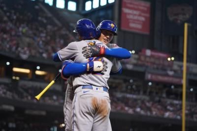 Brandon Nimmo And Teammates Celebrate Victory On Baseball Field