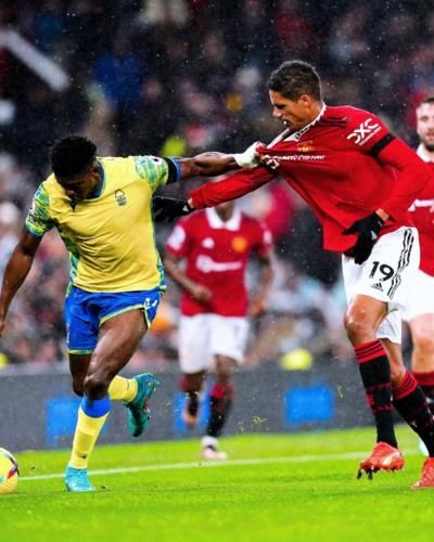 Raphael Varane Showcasing Teamwork And Success On The Field