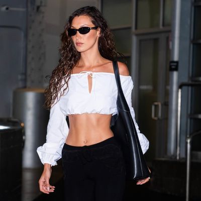 Bella Hadid Elevates the Capri Pants Trend With a Dreamy White Top and Coach Bag