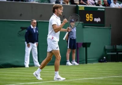 David Goffin Showcasing His Skills In A Classic White Ensemble