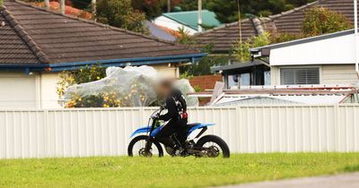 'Giant pack' of dirt bike riders seen taking over road and footpath