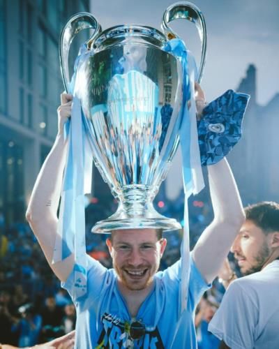 Kevin De Bruyne Celebrates Victory With Trophy Photos