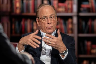 Larry Fink says America's $35 trillion national debt will be a 'big burden on the backs of our children' unless the private sector is given room to grow