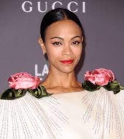 Zoe Saldana Radiates Elegance In Stunning Pink Ensemble