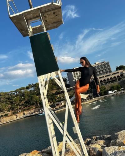 Samantha Misovic Showcasing A Chic Black Swimsuit With Confidence