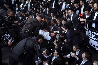 Israeli military says it will begin drafting ultra-Orthodox men. That could rattle the government