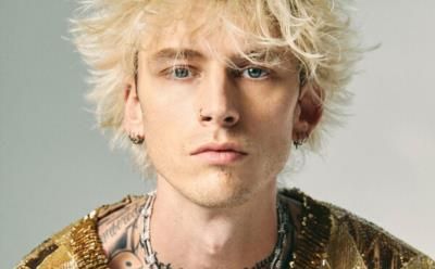 Machine Gun Kelly Debuts New Fangs And Tattoos On Instagram.