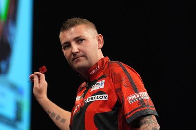 James Wade brings early end to Nathan Aspinall’s title defence